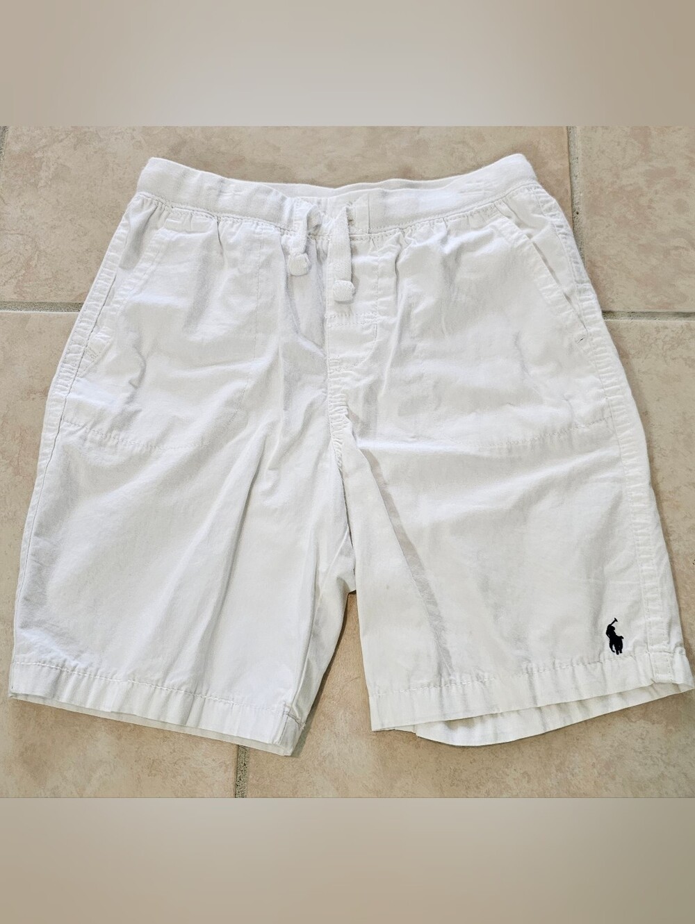 These Polo Ralph Lauren Boys White Cotton Stretchy Waist Shorts in size 7